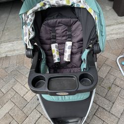 Graco Stroller In Black And Green