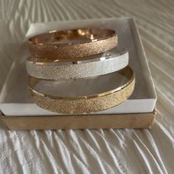Three Metal Bracelets 