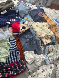 Lots of baby boy clothes
