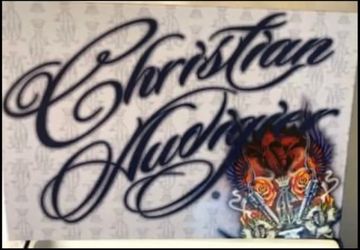 Christian Audigier 4-piece fragrance gift set.