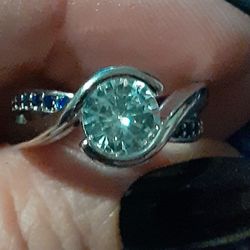 White Sapphire Solitaire with Blue Sapphire Accents