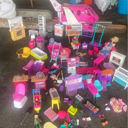 lot of accessories and a plane for barbie dolls