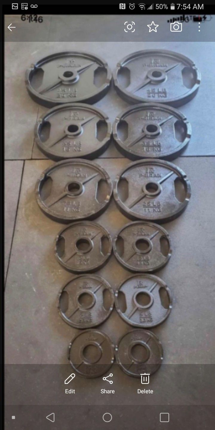 300lb Olympic weight set with barbell and clips