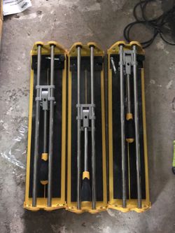 3 21 in tile cutters one missing cutting wheel