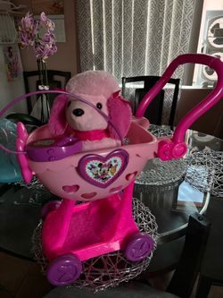 Walking dog and minnie mouse cart