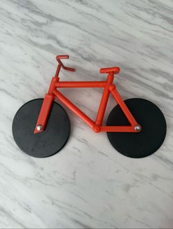 Bicycle shaped pizza cutter