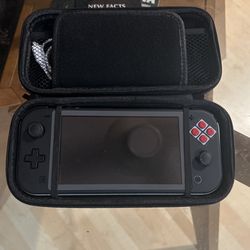 Nintendo Switch Lite (classic NES skin) + Case
