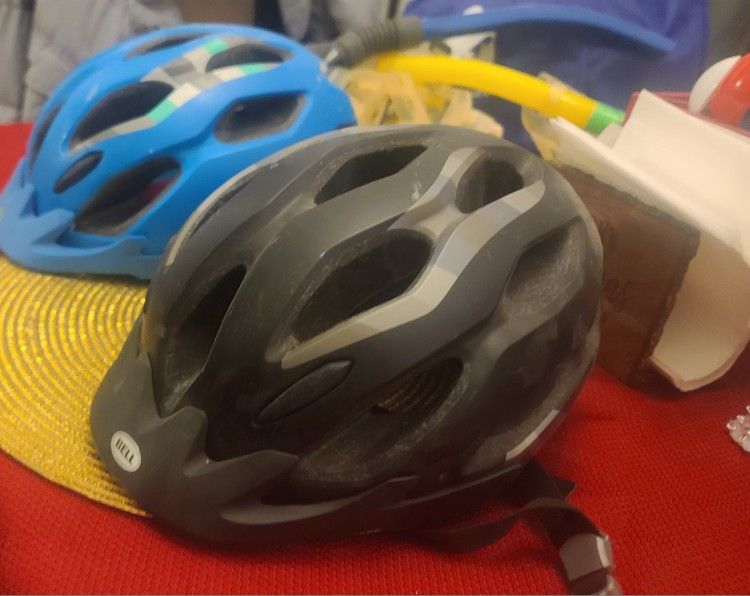2 Adult small bicycle helmets good shape. $10 apiece