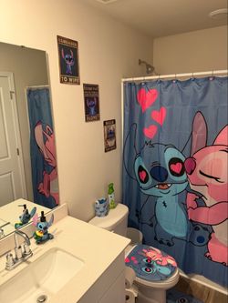 A stitch and angel bedroom set includes everything in the pics and bathroom set