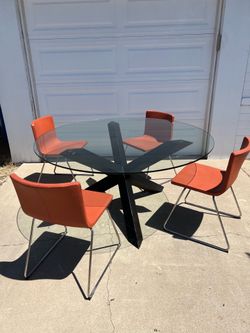 Large glass table, leather chairs