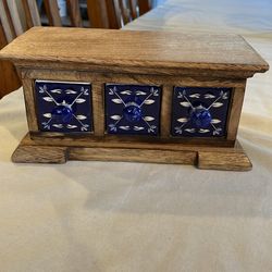 Wooden box with ceramic drawers