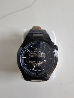 Bulova Skull face dress watch