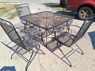 Mesa de patio con 4 sillas