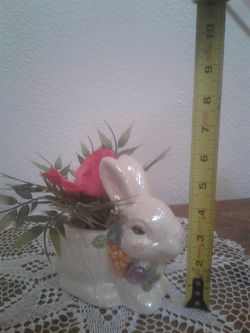 Artificial flowers in bunny pot $5