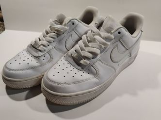 Nike Air Force white sneakers. Women 7 men 5