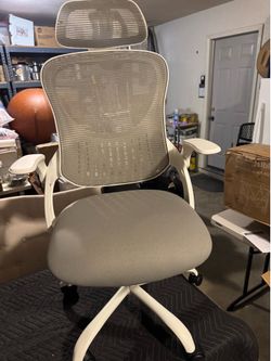 Two brand new office chairs, $50 each