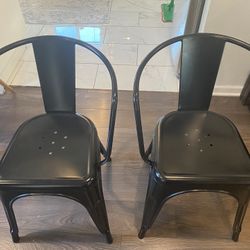 Two Black Metal Chairs 