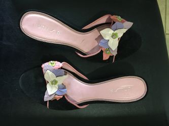 Unusable black suede and leather sandal