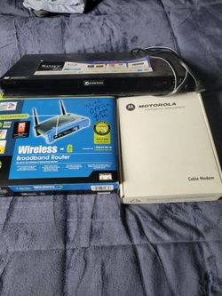 Motorola cable modem/ wireless  broadband  router/  blueray  disc/ DVD player
