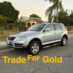 Volkswagen Tourage Suv/ Willing To Concider Trades In Gold 
