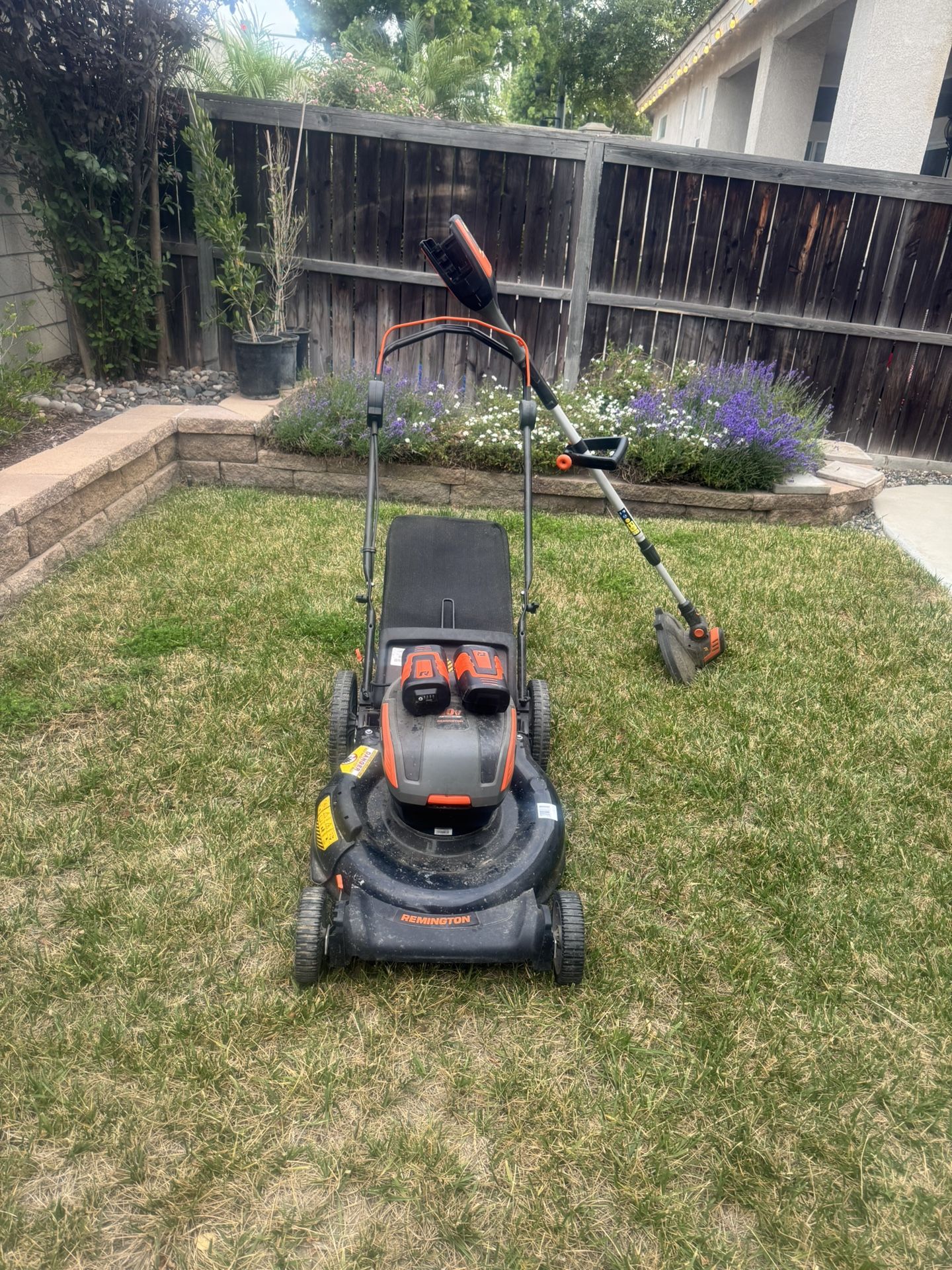 Battery Powered Lawn Mower And Trimmer