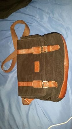 Fossil commuter bag with tag