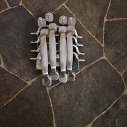 12 Stainless steel handles.