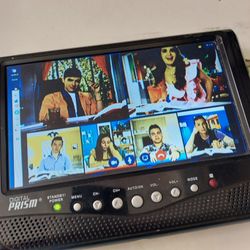 television portable en Buenas Condiciones Trabajando Bien Con Su Cargador 