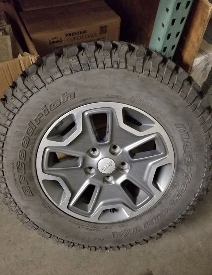 5 rims & tires for Rubicon 2014 - 4 rims with worn tires & 1 brand new rim & tire