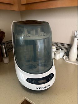 Baby breast washer dryer and steamer