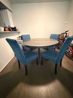 Round Dining Table with 4 Blue Chairs