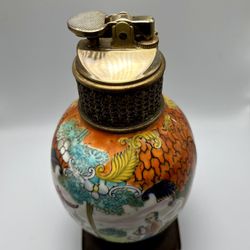 Porcelain antique table lighter made in Japan wooden stand