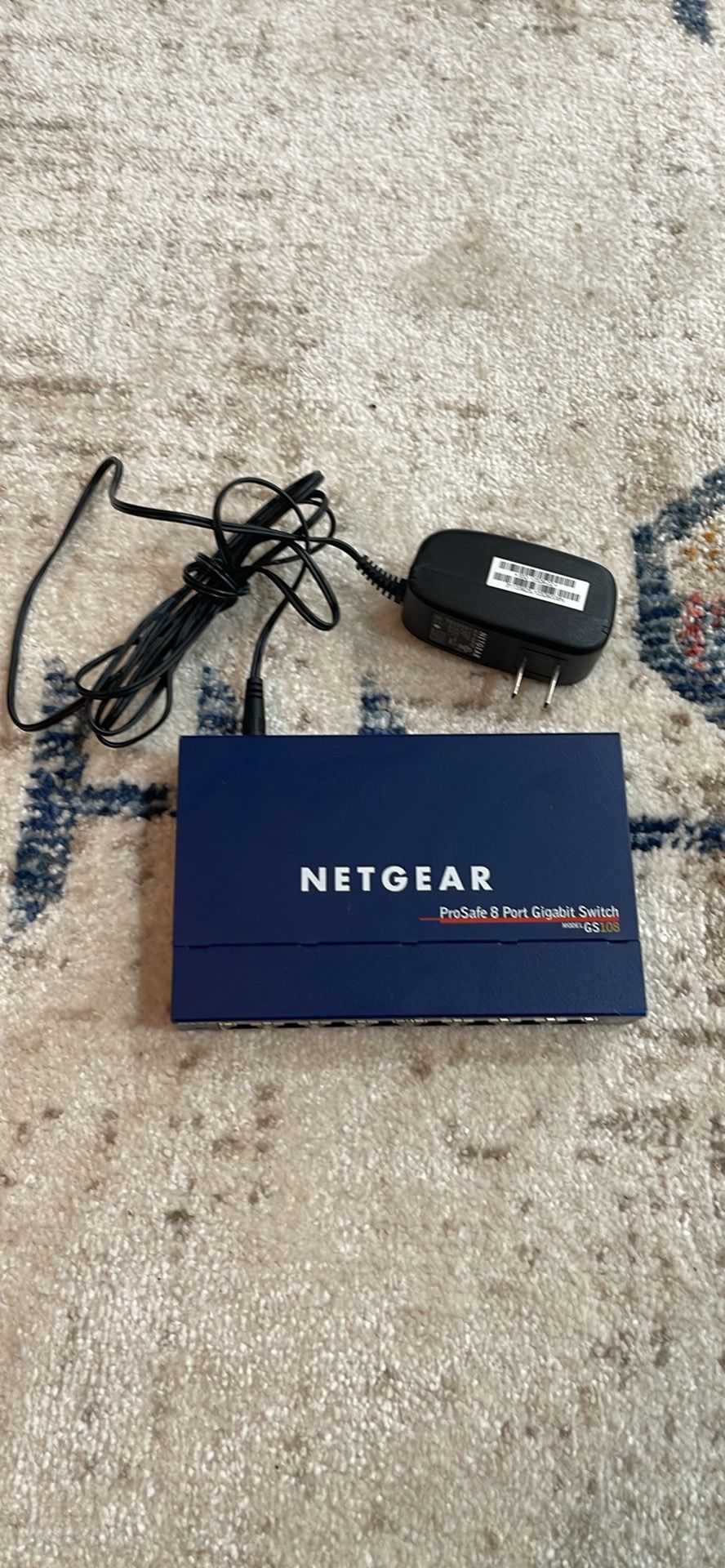 NETGEAR 8-Port Gigabit Ethernet Unmanaged Switch (GS108) - Desktop or Wall Mount, and Limited Lifetime 