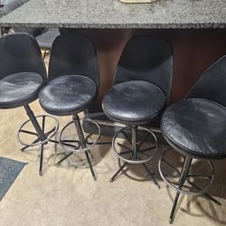 4 Swivel Bar Stools 