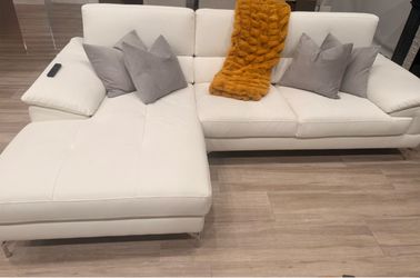 White Couch with Chaise and Adjustable Headrests