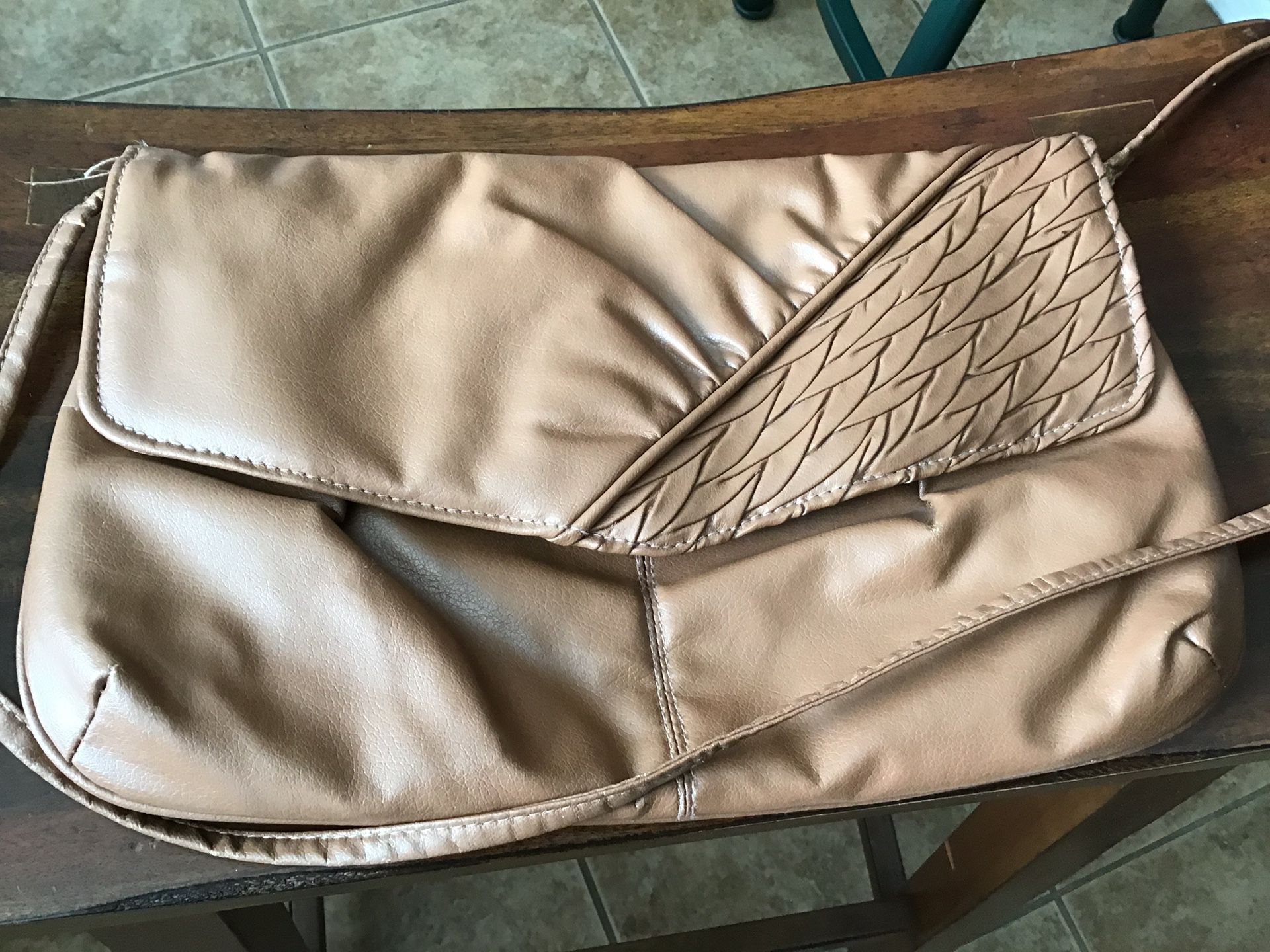 Brown fold over purse