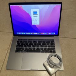 15 inch Macbook Pro 32gb ram touchbar