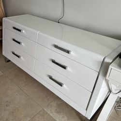 Modern contemporary 6-drawer dresser featuring a sleek, high-gloss white finish - Retail: $1299