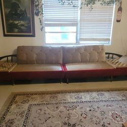 '70s era crushed red velvet mint with mosaic tile tables on the end