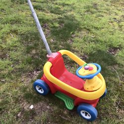 Very Nice Baby Riding Car With A Dark Handle Only $25