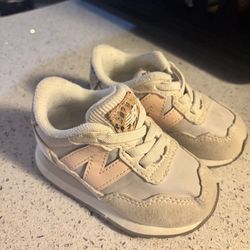 NEW BALANCE pink/sand snake print shoes