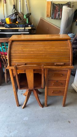 Wooden roll-top desk with chair