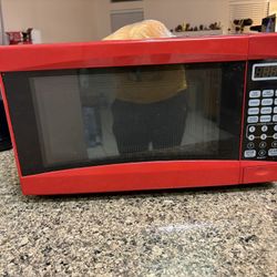 Red 700W Microwave – $20