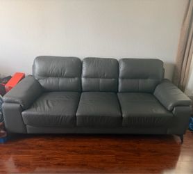 Used 3 seat grayish sofa with chair. Still in good condition