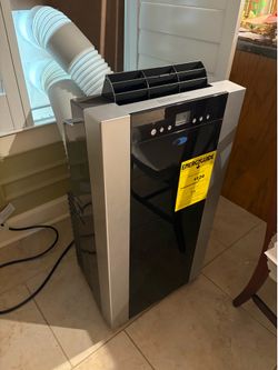 Portable air conditioner and dehumidifier window unit