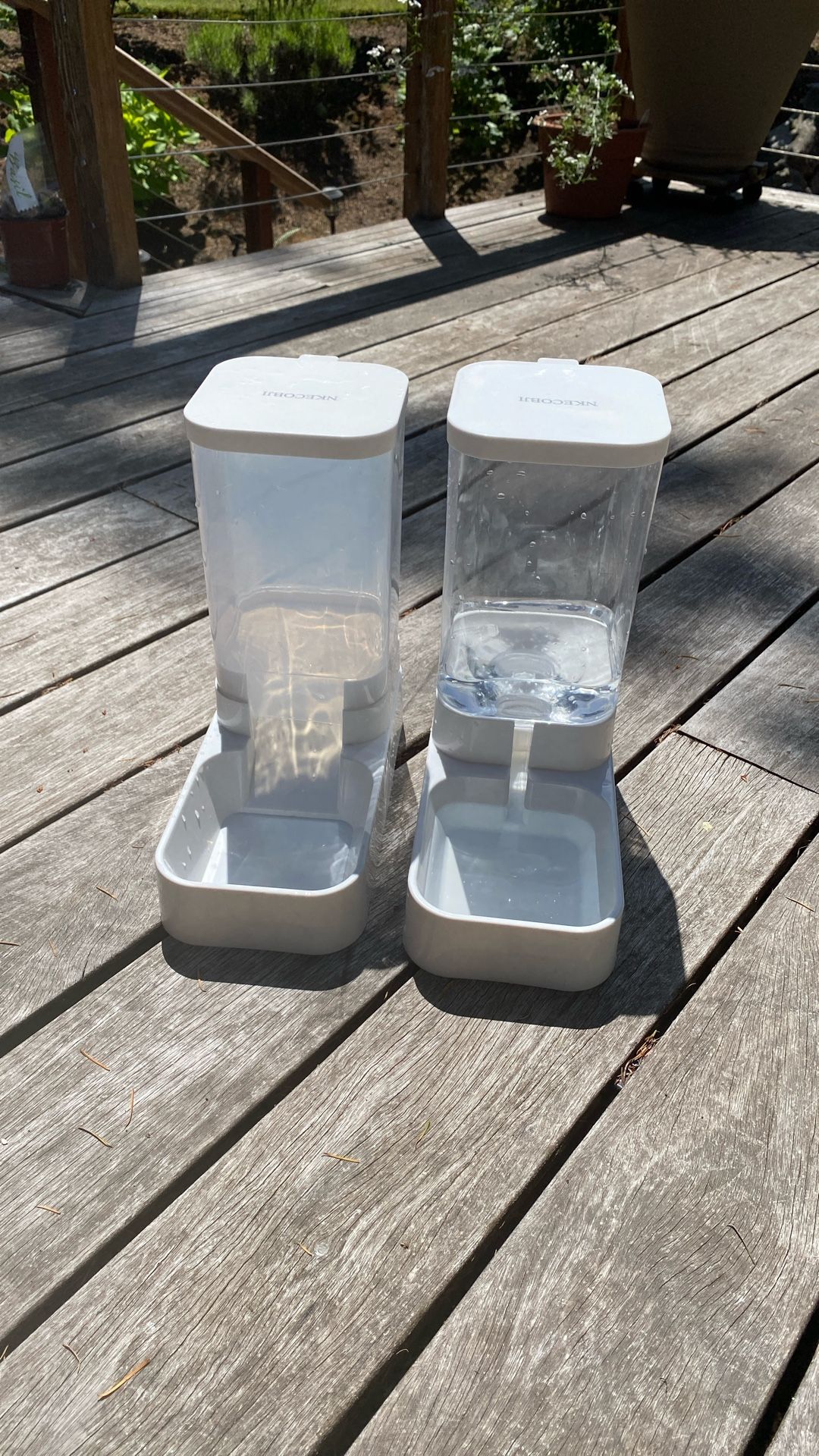 Gravity, pet food, and water dispenser