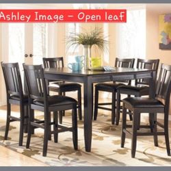 Ashley Furniture
Carlyle Butterfly Leaf
Counter Height Table