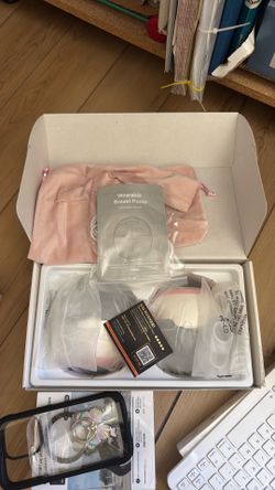 Wearable breast pump