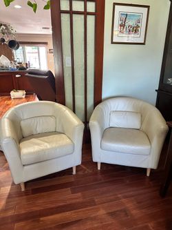 For sale to leather arm chairs
