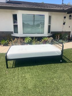 Twin bed frame and mattress